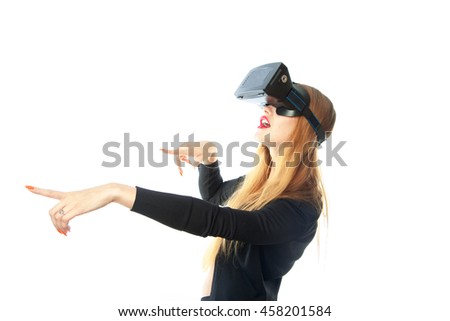 Beautiful girl in virtual reality glasses looking away isolated on white background. Virtual reality glasses. VR helmet. 