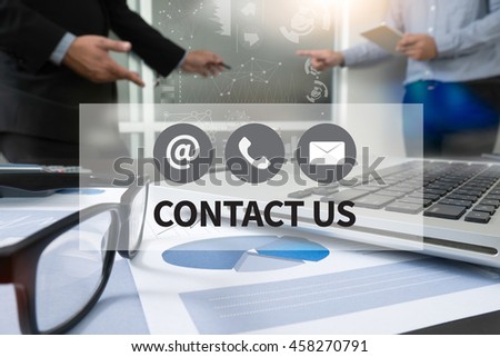 CONTACT US (Customer Support Hotline people CONNECT ) Businessman making presentation with his colleagues and business strategy digital layer effect at the office as concept