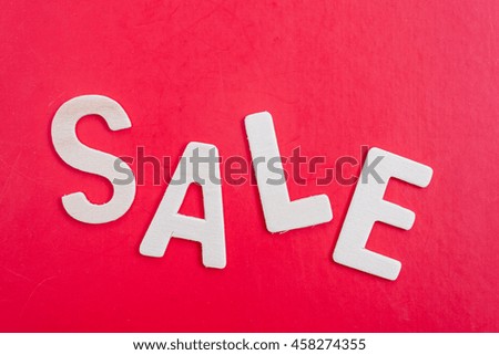 'sale' word on red background