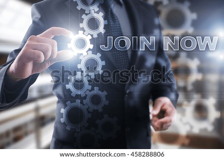 Businessman is selecting Join now on the virtual screen.