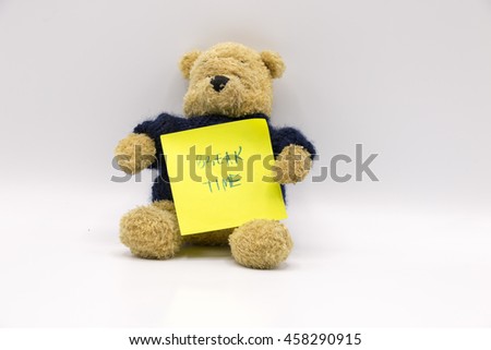 Bear with break time sign on yellow paper on white background