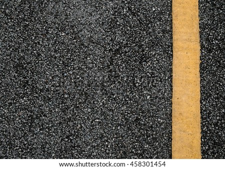 Asphalt Road Texture With Yellow Strip