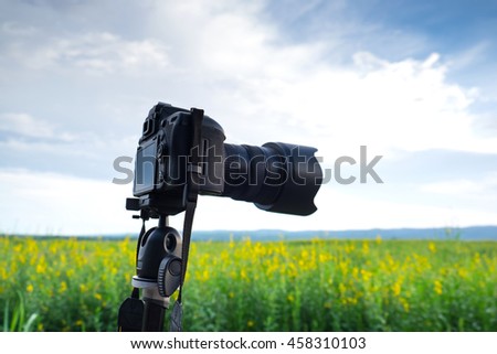 Camera on tripod with Beautiful nature in Thailand