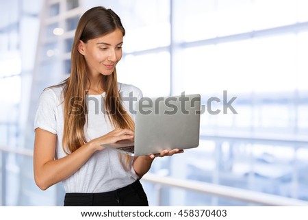 Casual woman with a laptop
