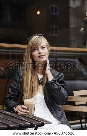 Portrait of beautiful babe in cafe