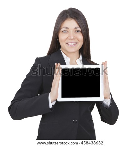middle-aged businesswoman with dark tailleur showing tablet