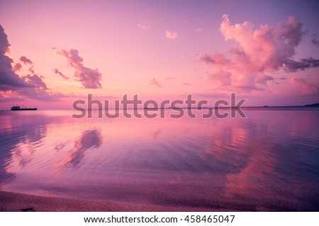 Early morning, pink sunrise over sea  Royalty-Free Stock Photo #458465047