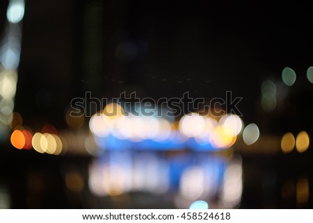 blur image bokeh background for Night city in singapore backdrop Light in dusk