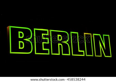 Green Berlin sign lightning. Berlin is the capital of Germany and with a population of approximately 3.6 million people, Berlin is the second most popular city in the European Union. 
