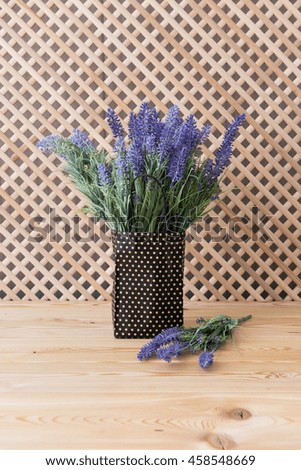 A bouquet of lavender on wooden background 
