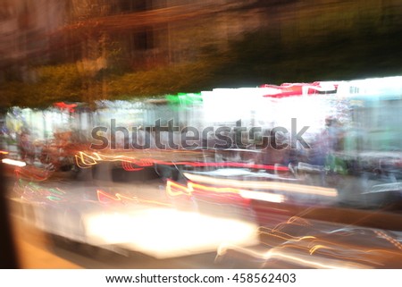 Street lights in speeding car, light motion with slow speed shutter