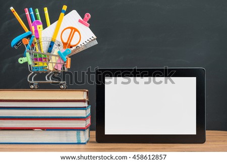 prepare the school supplies and Digital Tablet for back to school study