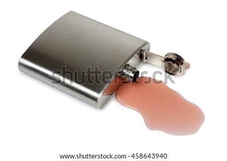 Flat metal flask and whiskey glass on white background