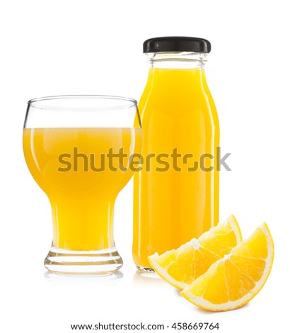 Orange juice bottle and slices of orange isolated on white