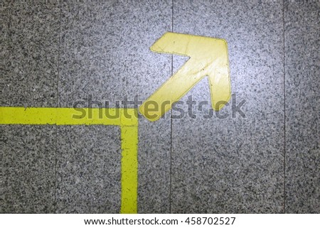 arrow with granito flooring background           
