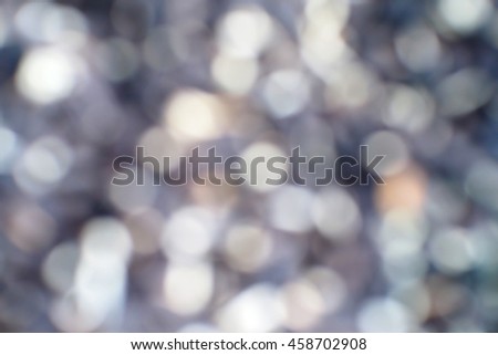 Blurred abstract background of white bokeh