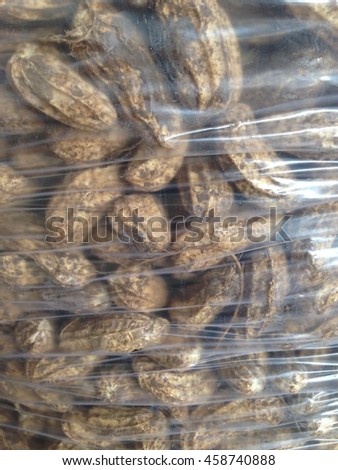 Close up a peanut in plastic bag in thailand