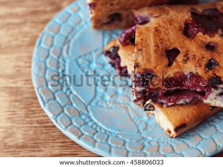 blueberry pie on beautiful blue plate

