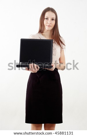 business woman showing a notebook - studio shot