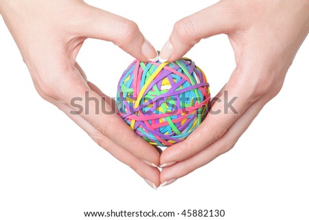 hand compresses a colour sphere