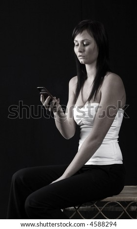 attractive young woman calling by cellular phone