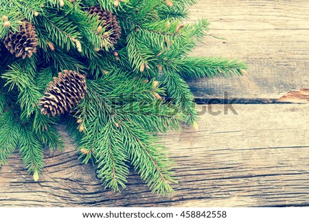 Christmas background with fir tree/toned photo