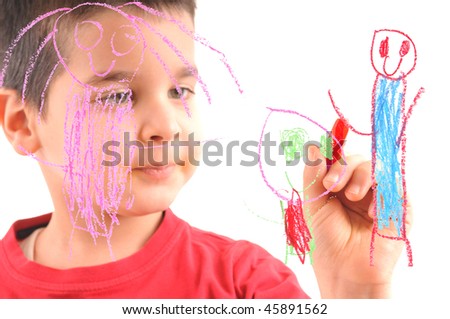 Adorable 6 years old boy painting his family on glass. White background high resolution studio image  focused at his hand, face out of focus.