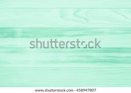 Green wood background on summer. Sweet color wooden texture wallpaper. plywood or hardwood paint board.