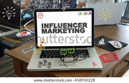 drawing icon cartoon with INFLUENCER MARKETING  concept on laptop in the office , business concept