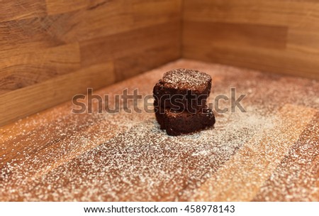 Chocolate brownies on a wooden board 