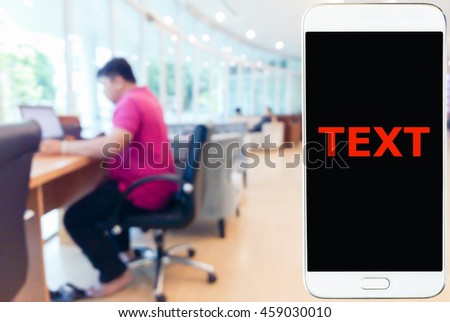 Girl use mobile phone, blur image of the customer waiting room as background.