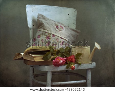 Still life with books and roses