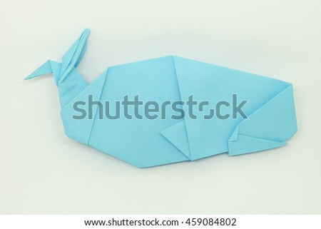 blue origami big whale beautiful simple have one tail made by one paper without cutting or tear