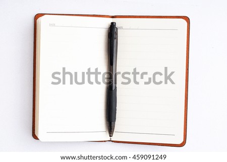 notepad with black pen isolated on white