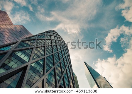 Skyscrapers with glass facade. Modern buildings in Paris business district. Concepts of economics, financial, future.  Copy space for text. Dynamic composition