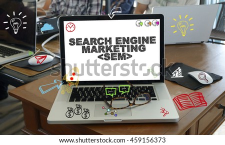 drawing icon cartoon with SEARCH ENGINE MARKETING  concept on laptop in the office , business concept