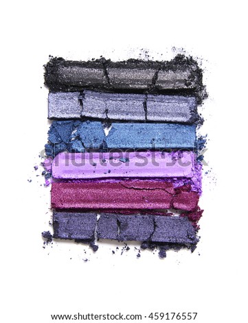 Broken purple and blue eye shadow make up palette isolated on a white background