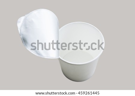 Opened white paper cup isolated on gray background.  White cup for product. select focus
