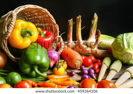 Include fresh organic vegetables on wooden floor with copy space 