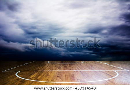 basketball court with storm cloud over background