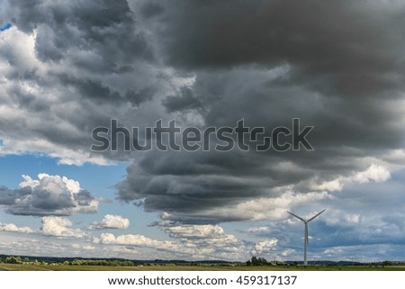 Cloudy Blue Sky as Background. Windmill.