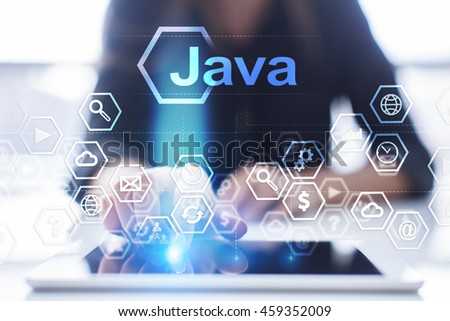 Woman is using tablet pc, pressing on virtual screen and select "Java".