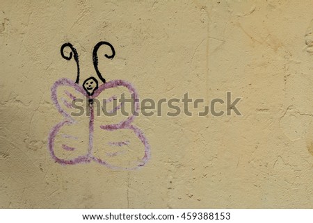 cement wall background with butterfly hand drawn picture