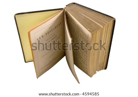 Old edition of New Testament isolated against white background.