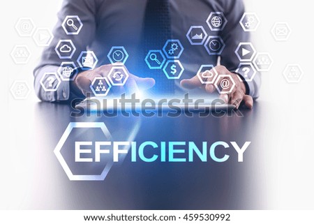 Businessman is using tablet pc and selecting Efficiency icon.