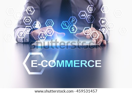 Businessman is using tablet pc and selecting E-commerce icon.