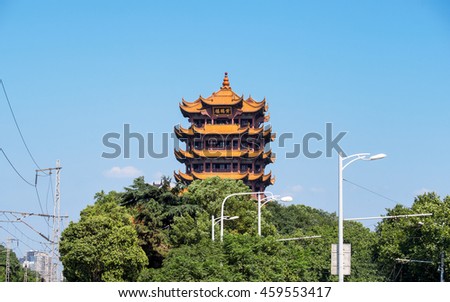 Yellow crane tower against blue sky in wuhan, China, the three Chinese characters mean "yellow crane tower".
