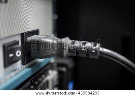 plug and switch (on/off) of server at data center - technology information Royalty-Free Stock Photo #459584203