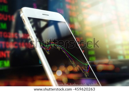Blur graph Stock market trading screen and laptop's lcd monitor with blurred out effect applied as business and stock background concept