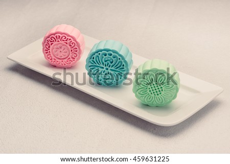 Snowy skin mooncakes. Chinese mid autumn festival foods. Traditional mooncakes on table